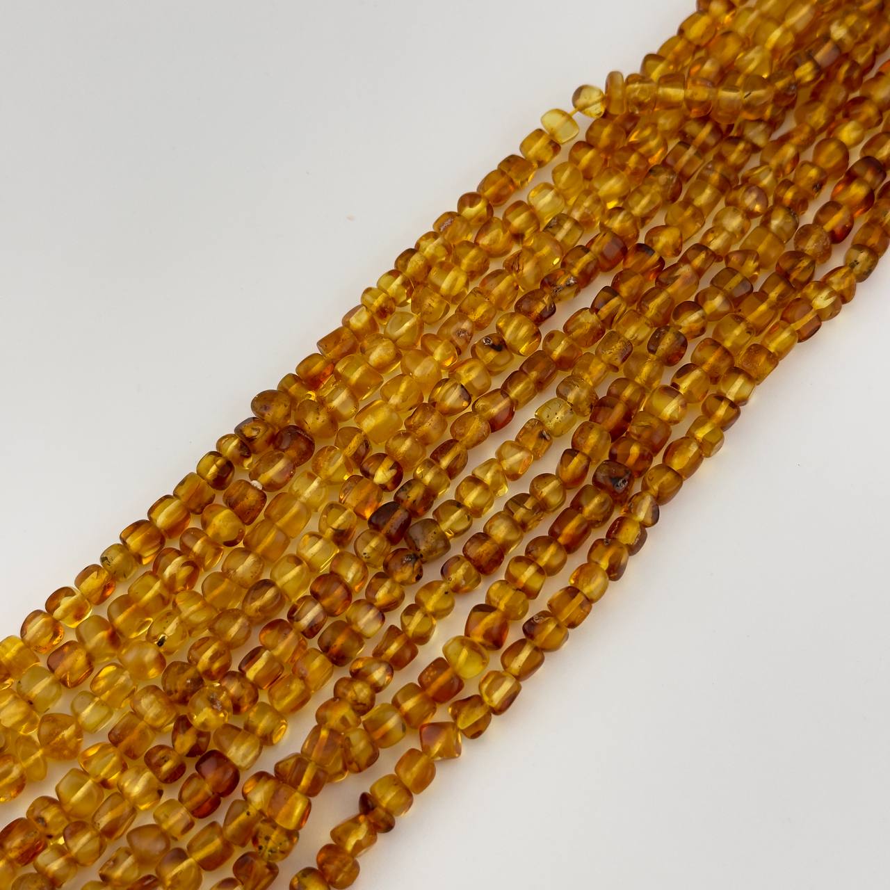 Бусины Янтарь натуральный размер 6*5мм